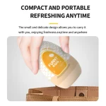 Travel-friendly design showing a compact male pleasure egg being discreetly placed into a leather handbag for on-the-go refreshing anytime.