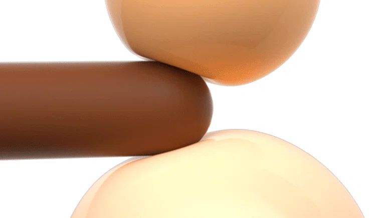 Macro detail shot showing the ultra-soft, body-safe silicone texture of the Mily massage wand as it presses against a flexible, skin-like surface.