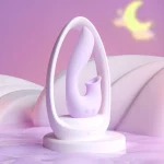 Lavender Moon Bud pleasure tool displayed on a soft aesthetic background under a crescent moon, emphasizing a relaxing nighttime vibe.