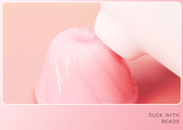 Close-up detail of the "Suck with Beads" feature, showing the soft suction nozzle of the adult toy interacting with a smooth pink texture for enhanced sensation.