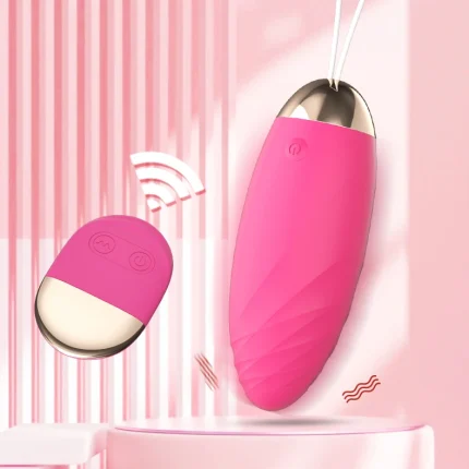 Modern pink clitoral stimulator and wireless remote set featuring a sleek ergonomic design and rose gold accents.