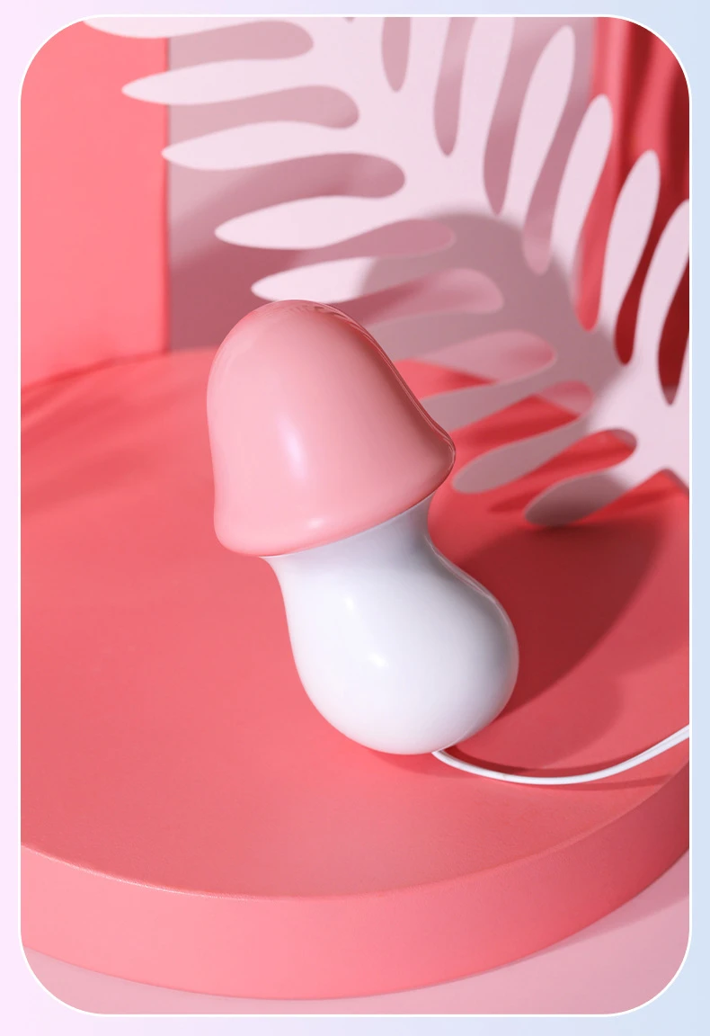Side profile of the ergonomic mushroom-shaped massage tool, designed to fit comfortably in the hand during use.