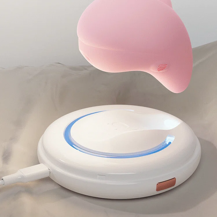 Magnetic induction charging base for the HH Neo Cove featuring a Type-C port and a futuristic blue LED indicator ring.