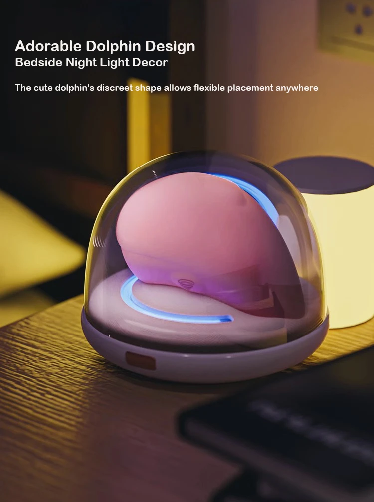 Discreet dolphin vibrator stored in a glowing LED charging base as bedside night light decor for modern bedrooms.