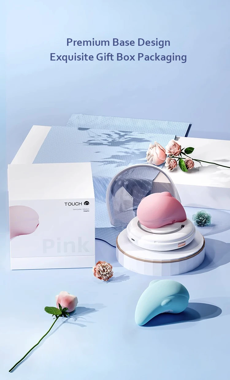 Luxury gift box packaging for the Touch In Dolphin pleasure device including a premium charging base and pastel-colored options.