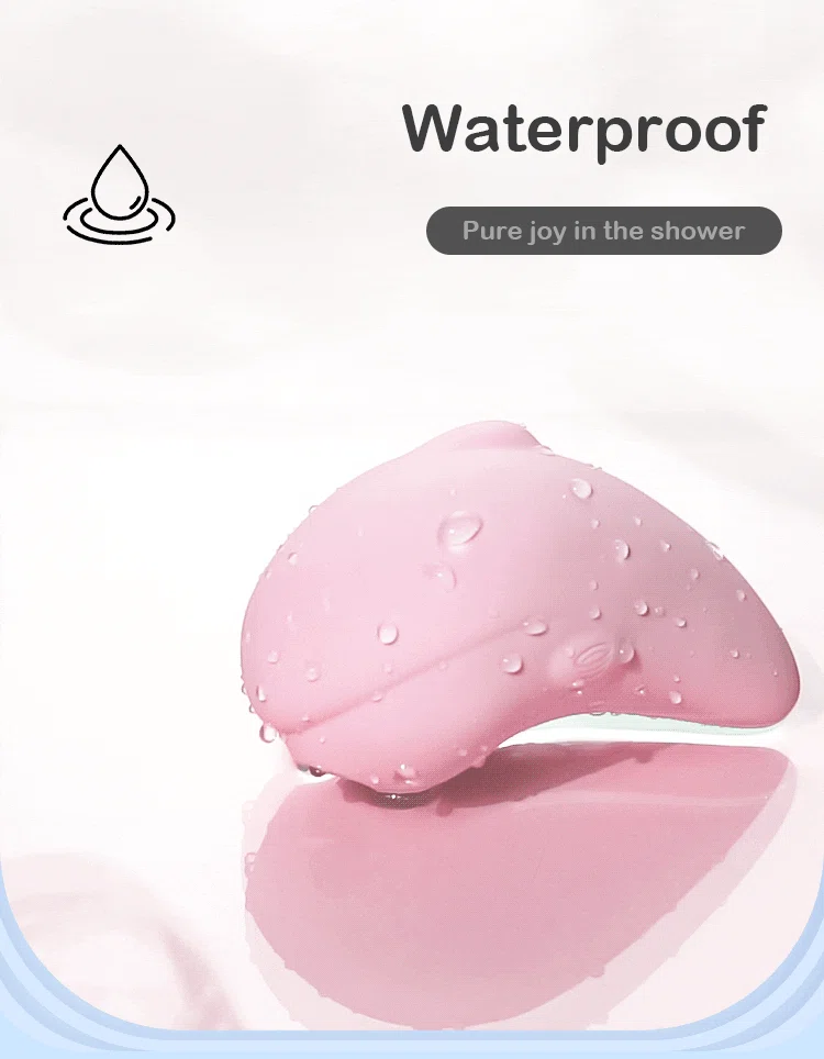 Waterproof pink intimacy toy covered in water droplets, demonstrating its IPX7 rating for versatile use in the shower or bath.