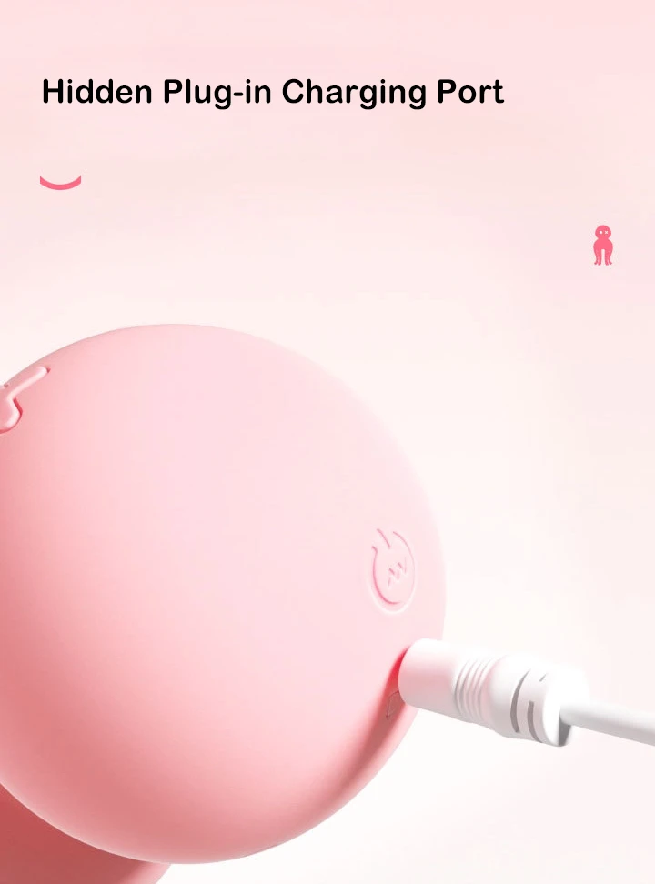 Detail shot of the hidden plug-in charging port on the pink octopus massager, ensuring a seamless and water-resistant design.
