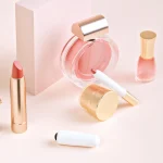 Lifestyle photography featuring the discreet Pearl Bullet tucked among high-end cosmetics and perfumes, emphasizing its travel-friendly and elegant aesthetic.