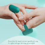 Lifestyle shot of a wearable ring-shaped vibrator on a finger, symbolizing romantic intimacy and a soft-touch finish for shared pleasure.