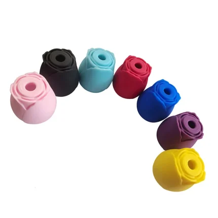 A collection of Rose Desire clitoral stimulators displayed in a variety of vibrant colors including pink, black, teal, red, blue, purple, and yellow.