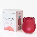 Product and packaging shot featuring the "Happy Meeting" luxury gift box next to the red rose-shaped clitoral massager.