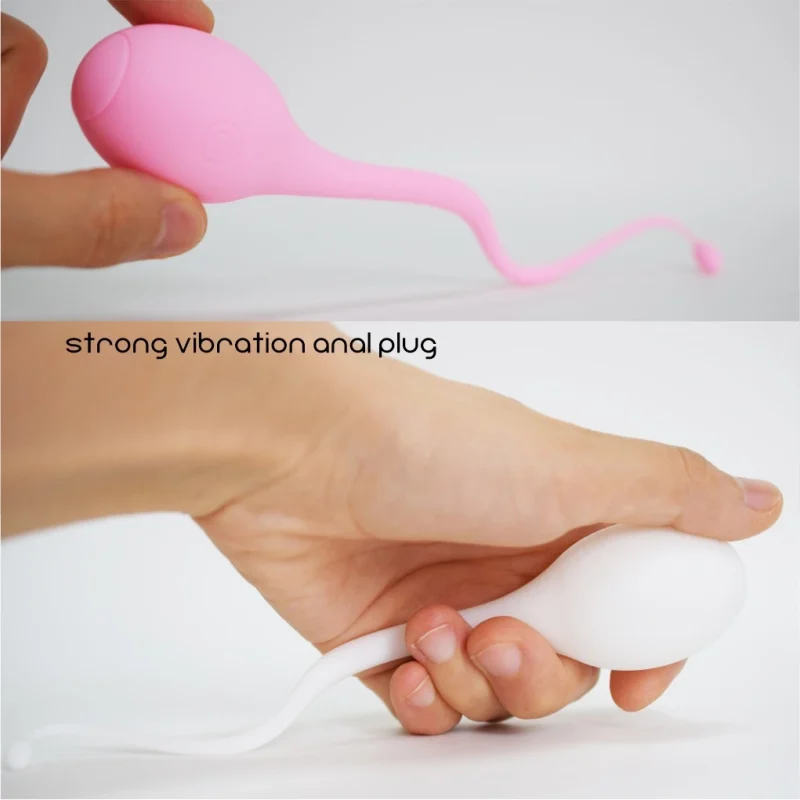 Handheld view of the pink and white sperm-shaped vibrators highlighting the flexible, tapered tail design for dual stimulation.