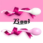 Comparison of white and pink ergonomic intimacy tools wrapped in silk ribbons highlighting the sleek aesthetic and curved design of the Baqi brand.