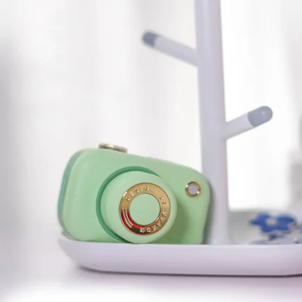 Discreet bedside placement of the clitoral suction toy, blending seamlessly with home decor on a jewelry tray.