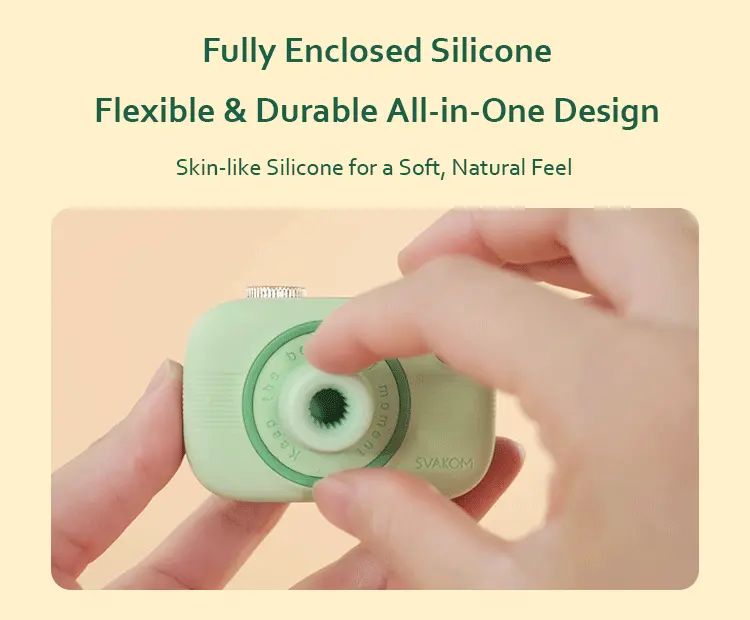 Demonstration of the soft, skin-like fully enclosed silicone texture on the suction nozzle of the portable intimacy tool.