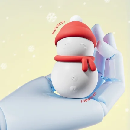 A handheld perspective of the Snowman intimacy tool held in a gloved hand to showcase its compact, ergonomic, and travel-friendly size.