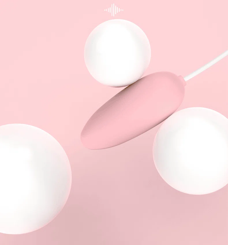 Minimalist aesthetic shot of the smooth, egg-shaped massage wand highlighting its quiet motor and discreet operation.