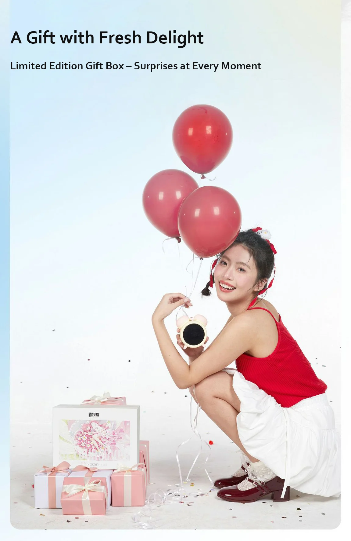 Lifestyle shot of the Tickle O'Clock hidden pleasure device presented as a 'Fresh Delight' gift, showcased with festive balloons and elegant gift wrapping to emphasize its appeal as a high-end personal wellness present.