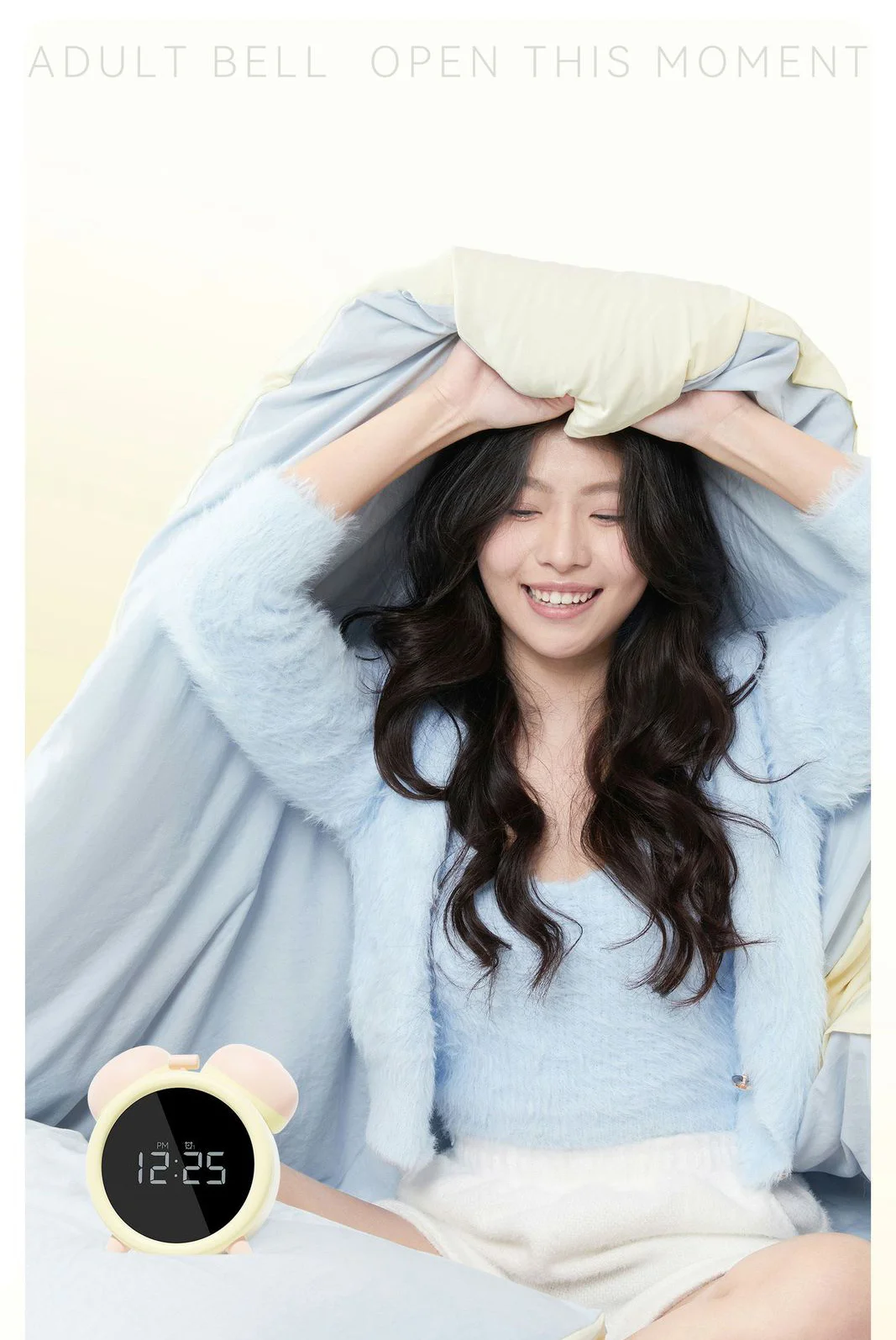 Lifestyle shot of a woman smiling under a duvet with the Tickle O’Clock, emphasizing discreet bedside use and morning wellness.