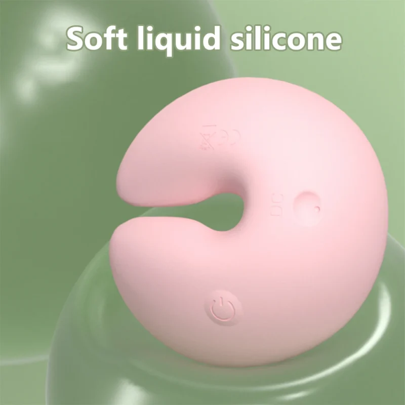 Detail shot of the high-quality soft liquid silicone texture on a curved pink body-safe intimacy tool.