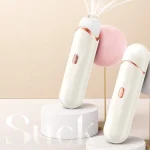 Dual WhisperWave clitoral suction vibrators in pearl white with rose gold accents displayed on modern aesthetic pedestals.