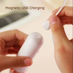 Close-up demonstration of the convenient magnetic USB charging port on the base of the waterproof adult toy.
