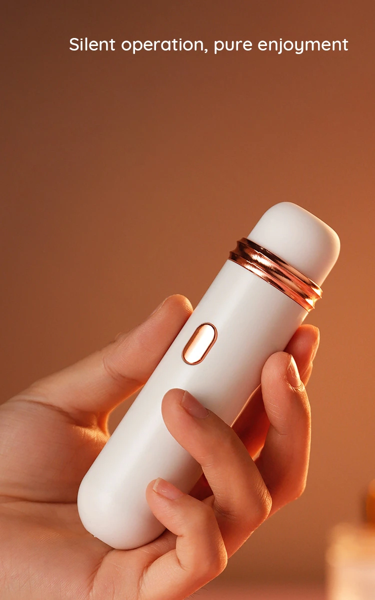 Handheld scale shot of the compact, travel-friendly vibrator highlighting its ergonomic design and single-button control.