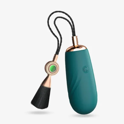 Teal green Beauty personal massager set including a unique jewelry-inspired clitoral stimulator.