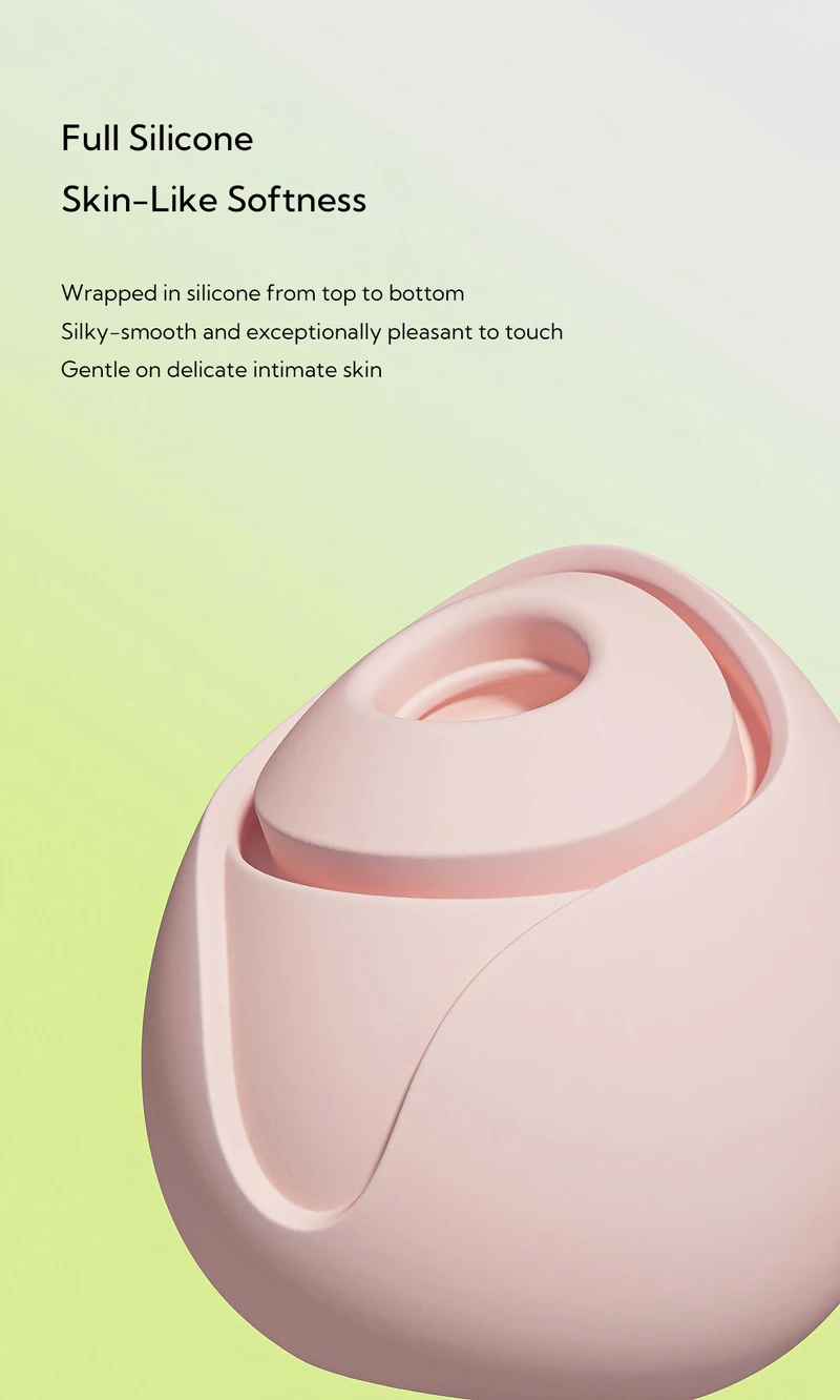 Close-up of pink silicone clitoral vibrator with skin-like softness text