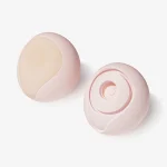 Peach clitoral vibrator shown from front and suction side views