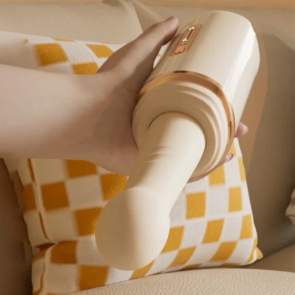 Hand holding a telescopic thrusting vibrator with rounded tip and control buttons Discreet Sex Toys Brand - HooHss