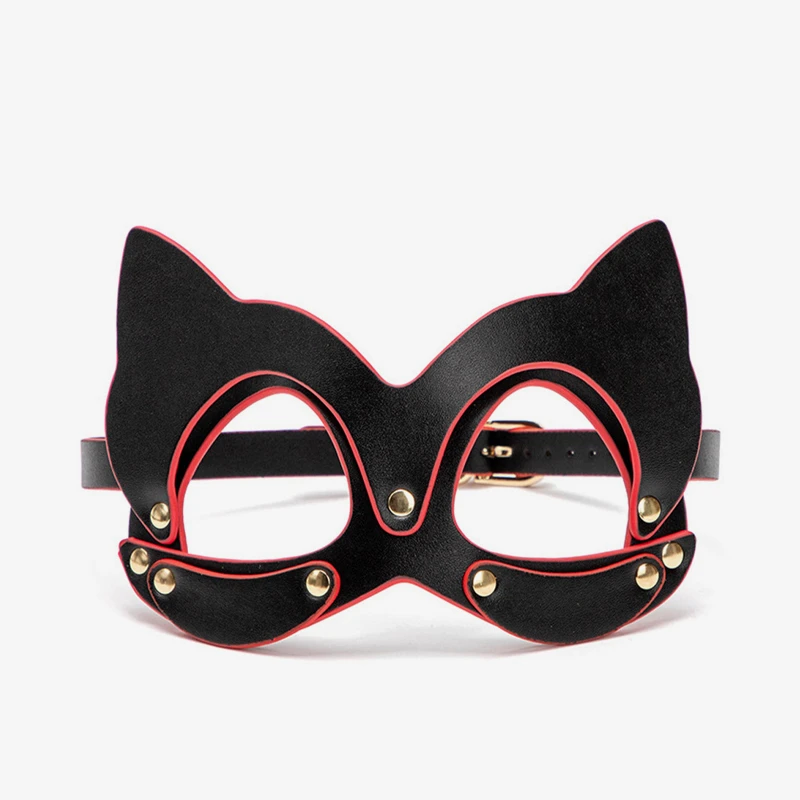 Symmetrical front view of black cat masquerade mask with red outline and metallic studs