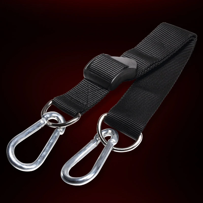 Close-up of adjustable nylon hanging strap with metal carabiners for adult swing setup