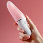 Handheld pink tongue vibrator with textured tip and white handle Discreet Sex Toys Brand - HooHss