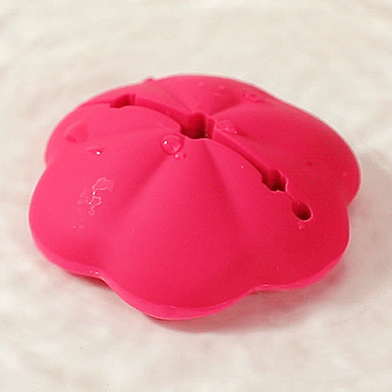 Pink flower shaped nipple clip accessory close-up Discreet Sex Toys Brand - HooHss