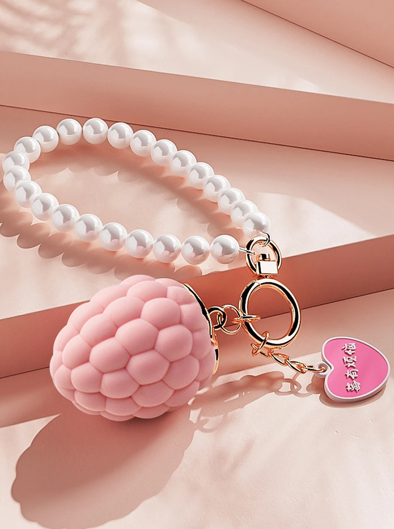 Pink berry shaped vibrating bracelet with white beaded loop and gold keychain clasp Discreet Sex Toys Brand - HooHss