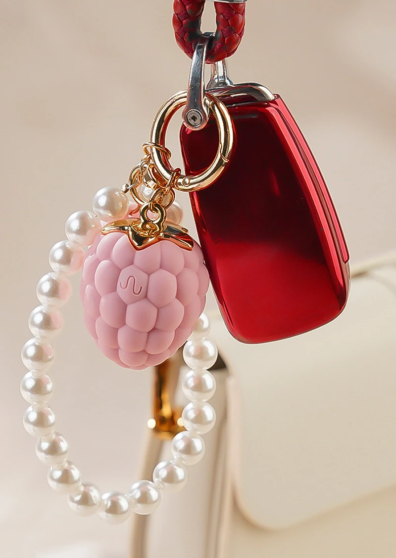 Berry shaped vibrating bracelet with pearl loop and red case charm Discreet Sex Toys Brand - HooHss
