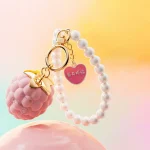 Berry-shaped vibrating bracelet with pearl-style band and heart charm Discreet Sex Toys Brand - HooHss