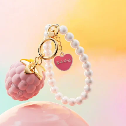 Berry-shaped vibrating bracelet with pearl-style band and heart charm Discreet Sex Toys Brand - HooHss