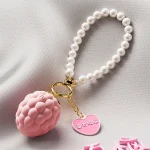 Pink berry-shaped vibrating bracelet with pearl-style loop and heart charm Discreet Sex Toys Brand - HooHss