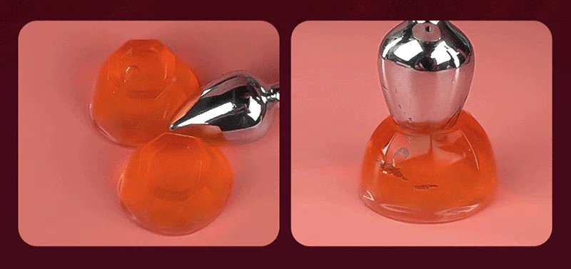 Metal anal plug shown with orange jelly suction cup base attachments Discreet Sex Toys Brand - HooHss