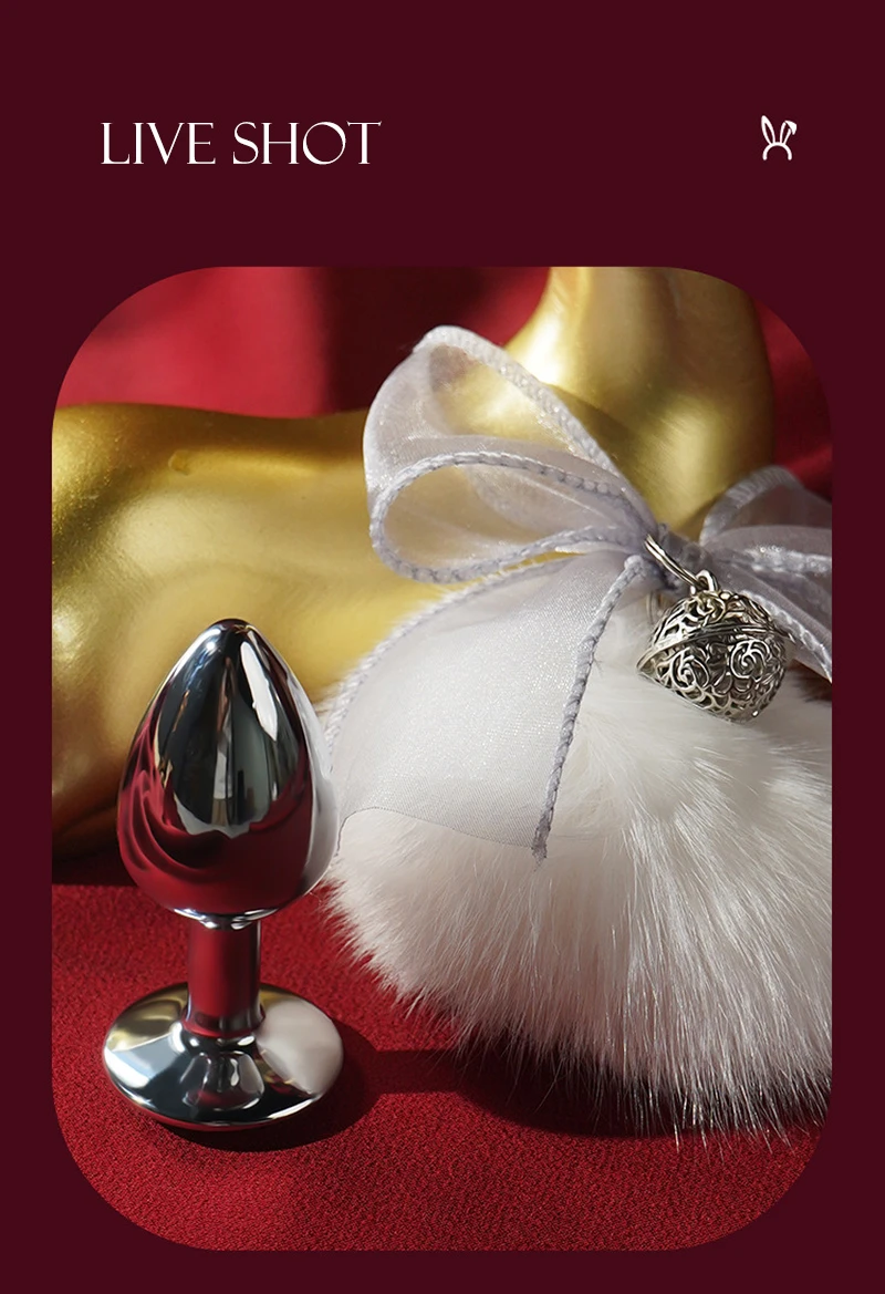 Metal anal plug beside white faux fur bunny tail gift box Discreet Sex Toys Brand - HooHss