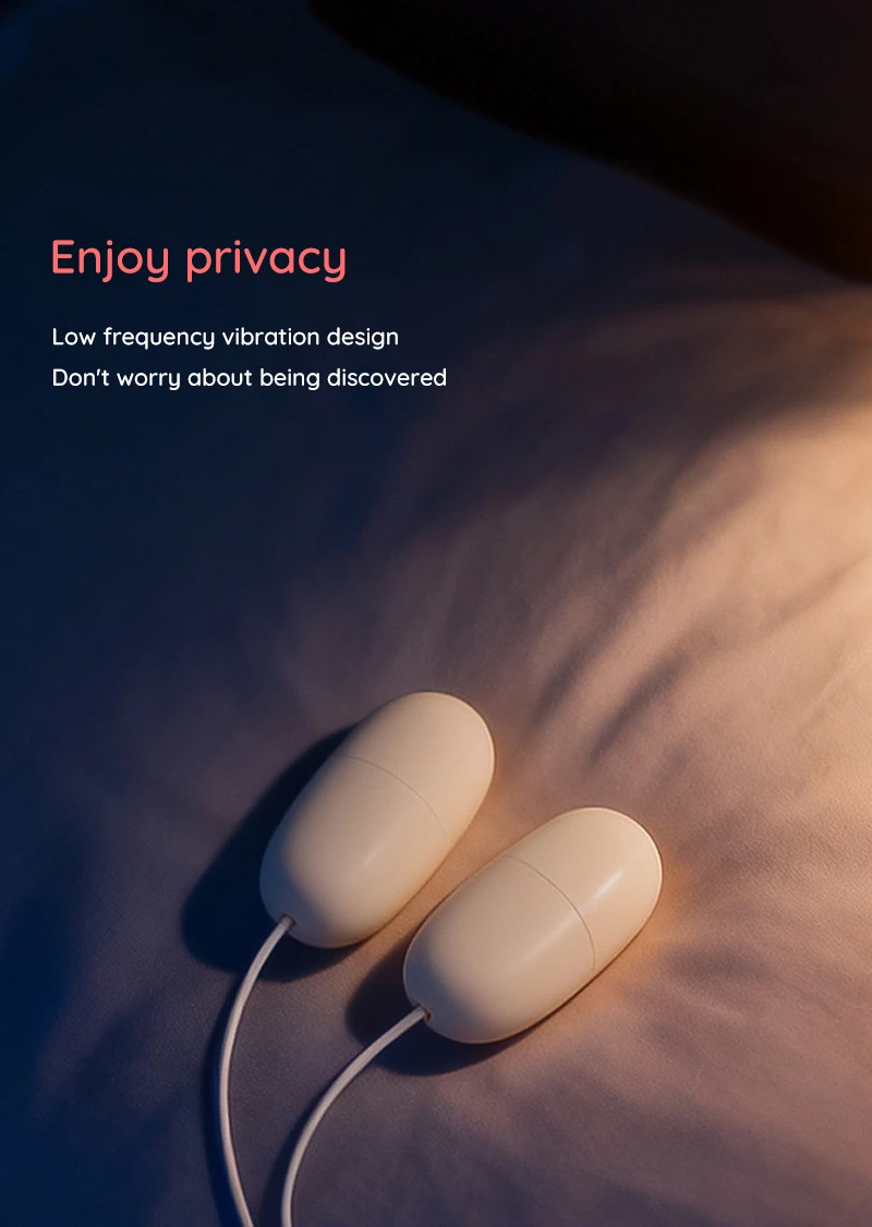 Double egg vibrator with wired control on fabric background Discreet Sex Toys Brand - HooHss