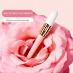 Slim beginner vibrator with white tip and pink handle displayed in a pink flower Discreet Sex Toys Brand - HooHss